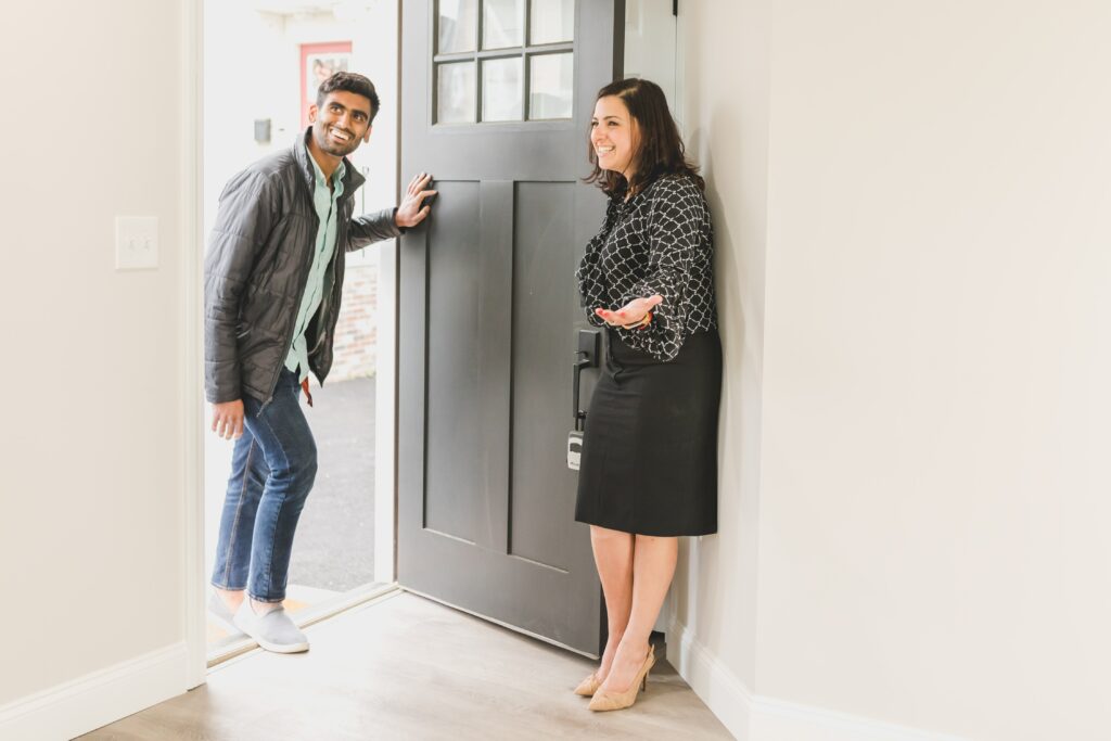 agent showing rental properties to prospective tenant